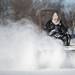 Brighton resident, and past Whitmore Lake resident, Max Dargan maintains an ice rink using a Grasshopper lawnmower with a broom attached to the front on Saturday, Feb. 9. He says this is their "zamboni" and he has been doing it for six years. Daniel Brenner I AnnArbor.com